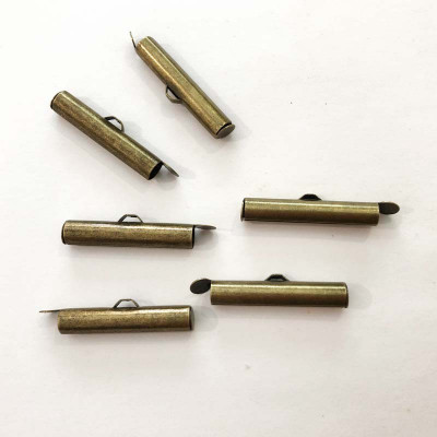 26*5 mm. , 6 embouts à glissière, laiton bronze
