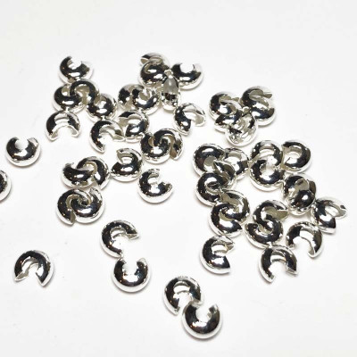 4 mm, 50 caches noeuds, métal argenté brillant