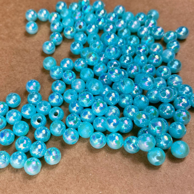 50 boules bleu 6 mm. acrylique irisé